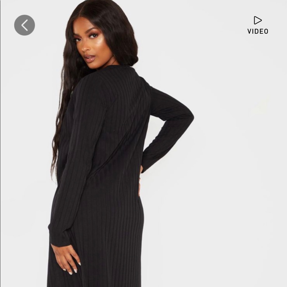 Black long cardigan.  Brand new. Never worn